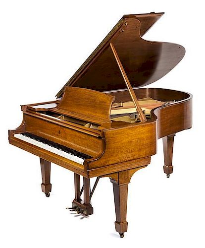 A Steinway and Sons Baby Grand Piano Width of keyboard 48 3/8 inches.
