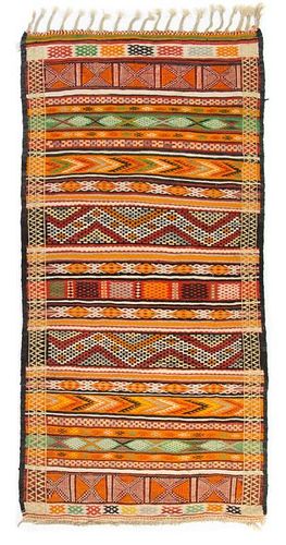 * A Moroccan Wool Rug 3 feet x 6 feet.