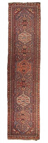 A Persian Wool Runner 12 feet 8 inches x 2 feet 11 1/4 inches.
