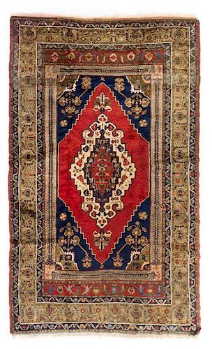 A Tabriz Wool Rug 7 feet 2 inches x 4 feet 2 inches.