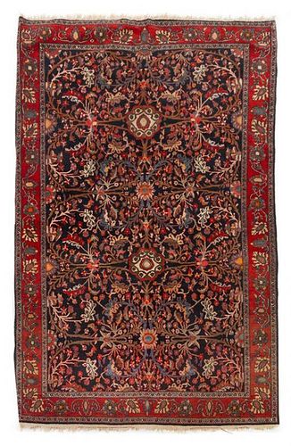 * A Persian Wool Rug 6 feet 7 inches x 4 feet 3 inches.