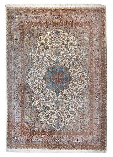 * A Tabriz Wool Carpet 13 feet 4 inches x 9 feet 9 inches.