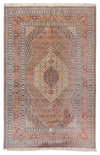 * A Tabriz Wool Carpet 9 feet 7 inches x 6 feet 5 inches.