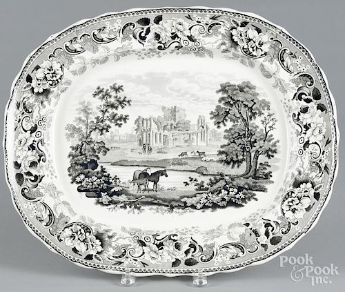 Black Staffordshire landscape platter, 19th c., marked by Dillon, 16'' l., 19 3/4'' w.