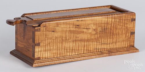 Contemporary tiger maple slide lid box, 5 1/4'' h., 16 3/4'' w., 5 1/2'' d.