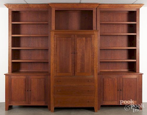 Cherry cabinet, by Thomas Moser, together with a custom five-part cherry bookcase surround, 94'' h.
