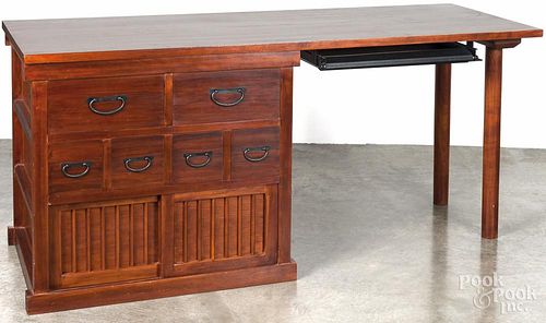 Modern cherry computer desk, 30'' h., 65 1/2'' w., together with a hanging cupboard with sliding doors