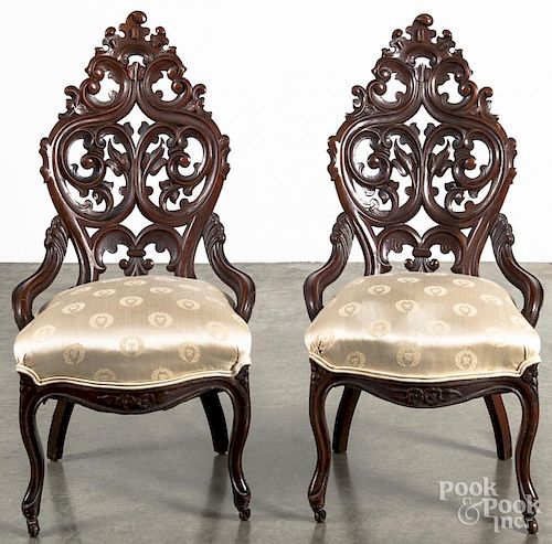 Pair of Victorian carved walnut side chairs.