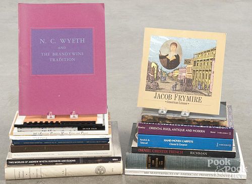 Reference books on American art and assorted antique topics.