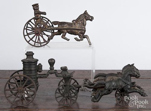 Cast iron horse drawn fire pumper, 19th c., 15'' l., together with a cast iron horse drawn cart, 8'' l