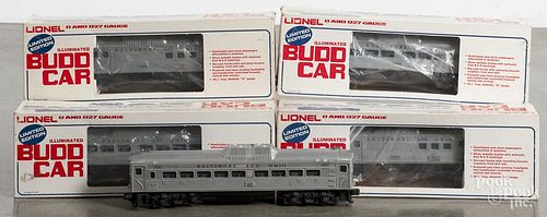 Four Lionel BUDD train cars, O gauge, with their original boxes, together with a 400 passenger car