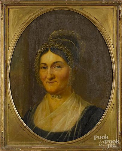 American oil on canvas portrait of a woman, mid 19th c., 22 1/2'' x 17 1/2''.