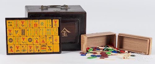 Chinese mahjong set, late 19th c., with a hardwood case, 6'' h., 8 3/4'' w.