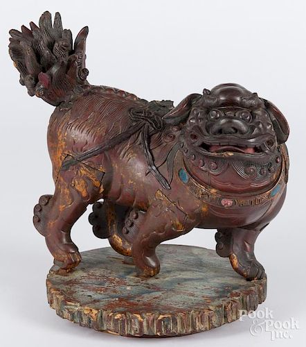 Chinese carved and painted foo dog, early 20th c., 13 1/2'' h.