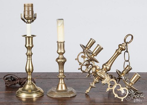 Two brass candlesticks, 18th/19th c., (electrified), 7 1/4'' h. and 8 1/4'' h.
