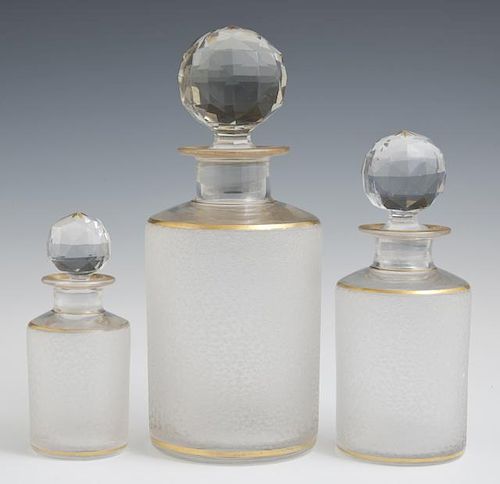 Three French Parcel Gilt Graduated Glass Perfume B