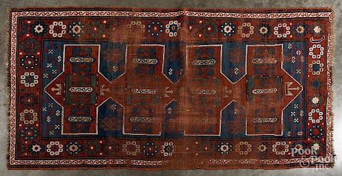 Two Caucasian throw rugs, early 20th c., 6'10'' x 3'5'' and 5' x 3'7''.