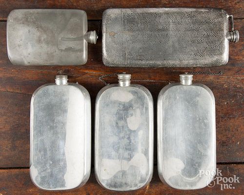 Three Abercrombie and Fitch pewter flasks, together with two others, tallest - 11 1/2''.