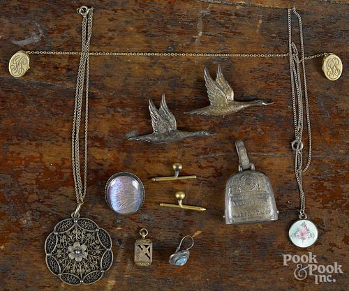 Assorted antique jewelry, to include two sterling silver geese pins, a butterfly wing pin