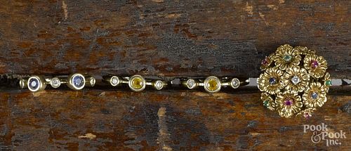 Set of three 14K yellow gold rings, inset with diamonds and gemstones