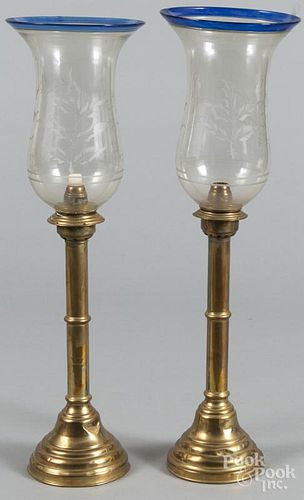 Pair of European brass candlesticks with etched glass shades, 23 1/4'' h.