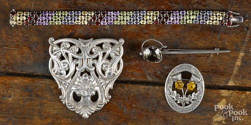 Sterling silver brooch or cloak pin, with floral decoration, 2 3/4'' h., 2 1/2'' w.