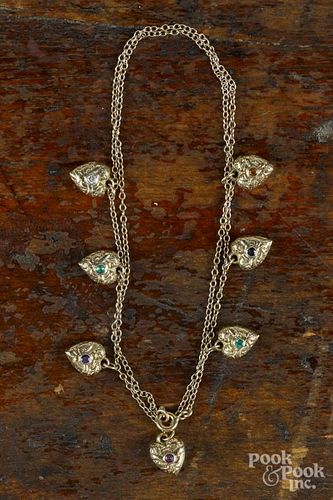 Multi gemstone ''Dearest'' necklace, 9K yellow gold, featuring seven repoussé heart charms