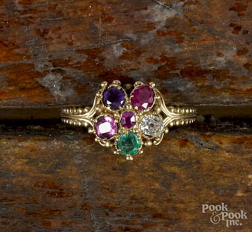 14K yellow gold ring with a flower-shaped cluster of various gemstones, including a diamond