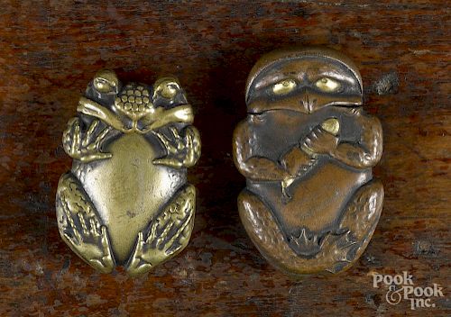 Two brass frog match vesta safes, ca. 1900, 2'' l. and 2 1/4'' l.