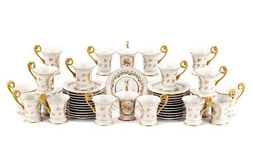 Parcel Gilt Decorated White Ground Cups & Saucers