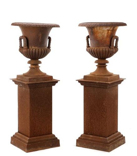 Pair of Large Cast Iron Garden Urns on Pedestals