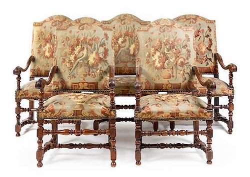 * An Assembled Set of Five French Baroque Walnut Armchairs Height 46 1/2 inches.