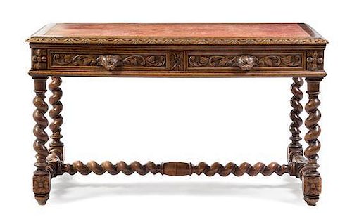 * A Flemish Baroque Style Walnut Writing Table Height 29 x width 52 x depth 27 1/2 inches.