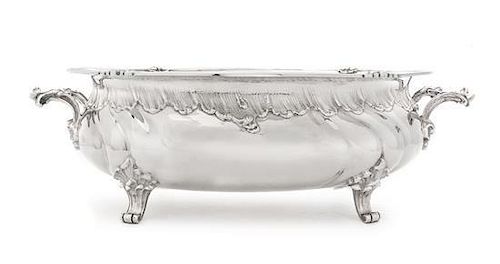 * A German Silver Jardiniere, Hermann Behrnd, Dresden, 19th Century, of oval form with rocaille handles and a similarly worked b