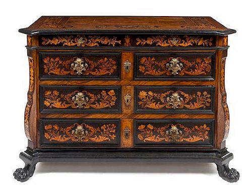 * An Italian Baroque Walnut and Marquetry Chest of Drawers Height 39 1/2 x width 58 x depth 27 inches.