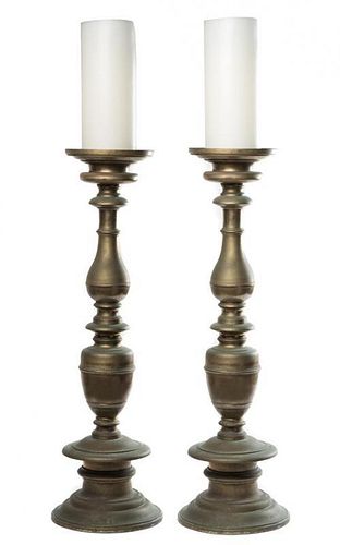 * A Pair of Baroque Style Brass Prickets Height 33 1/2 inches.