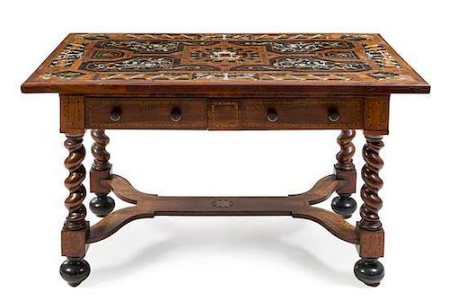 * A Louis XIII Style Marquetry and Walnut Table Height 29 1/2 x width 51 1/2 x depth 31 1/2 inches.