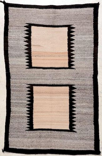 A GOOD C. 1940 NAVAJO RUG WITH TWO FLOATING WINDOWS