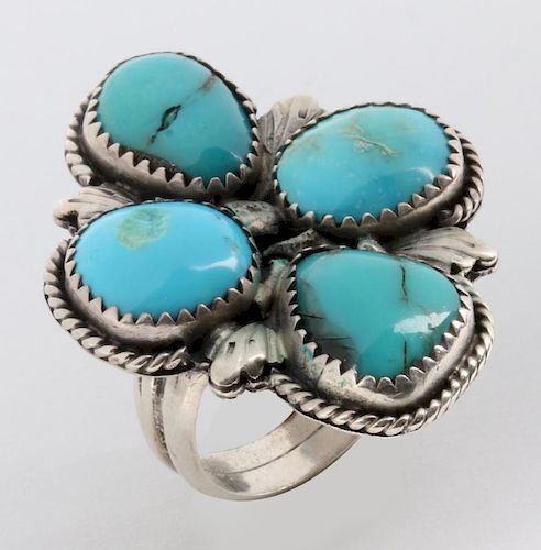 A NAVAJO STERLING AND TURQUOISE RING