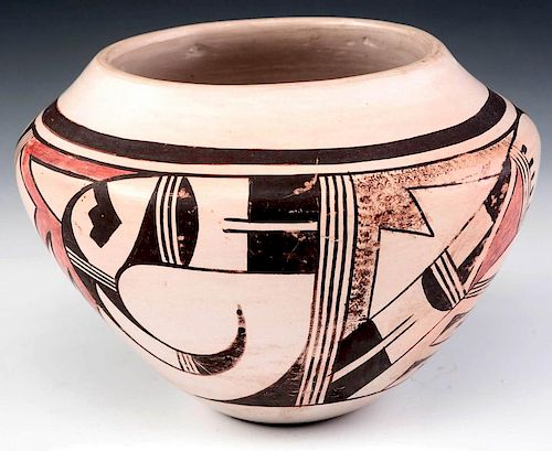 A HOPI INDIAN POTTERY OLLA WITH FEATHER SIGNATURE