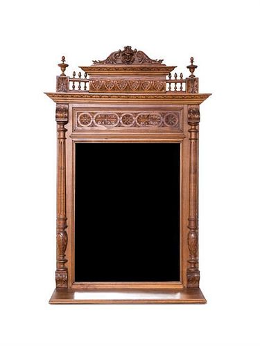 A French Chestnut Brittany Style Mirror Height 51 1/2 x width 30 inches.