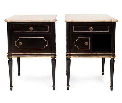 A Pair of Louis XVI Style Parcel Gilt Ebonized Commodes Height 24 3/4 x width 17 3/4 x depth 13 1/2 inches.