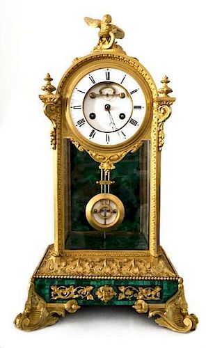 A Neoclassical Gilt Bronze and Malachite Mantel Clock Height 21 1/2 inches.