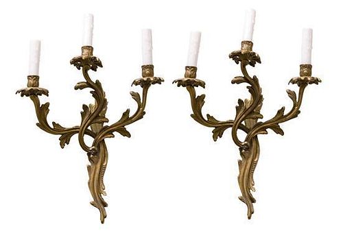 A Pair of Rocaille Bronze Three-Light Sconces