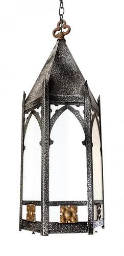 A Gothic Style Metal and Glass Lantern Height 28 inches.