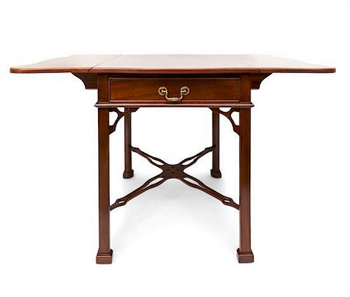 A Chippendale Style Mahogany Pembroke Table Height 28 3/4 x width 23 x depth 32 inches (closed).