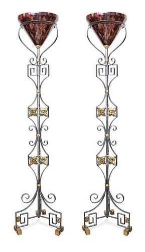 A Pair of Wrought Metal and Brass Torcheres Height 74 1/4 inches.