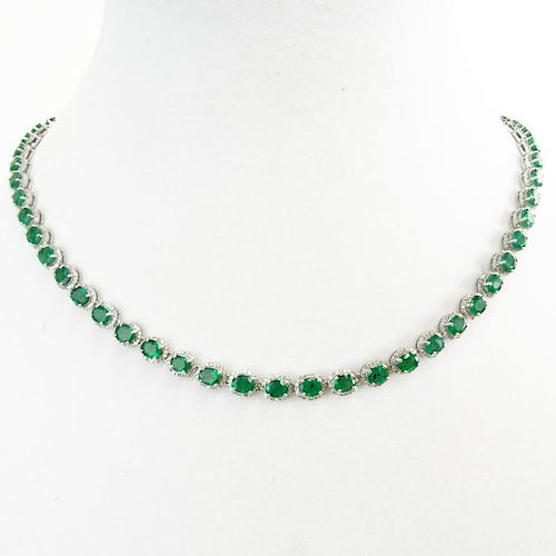 AIG Certified 20.63 Carat Oval Cut Emerald, 3.95 Carat Round Brilliant Cut Diamond and 14 Karat White Gold Necklace.