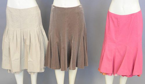 Three Akris Punto women skirts, tan, tan velvet, and pink (size 6).
