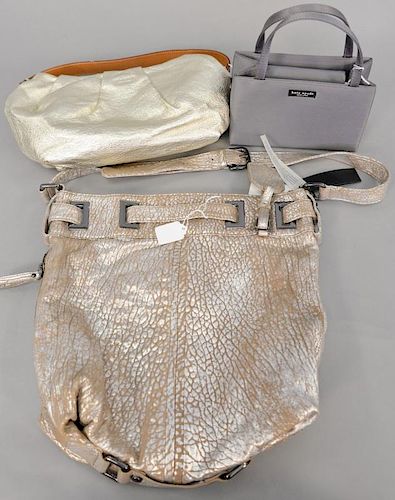 Three purses to include Kate Spade silk grey handbag (5 1/2" x 8" x 2 3/4"), leather...